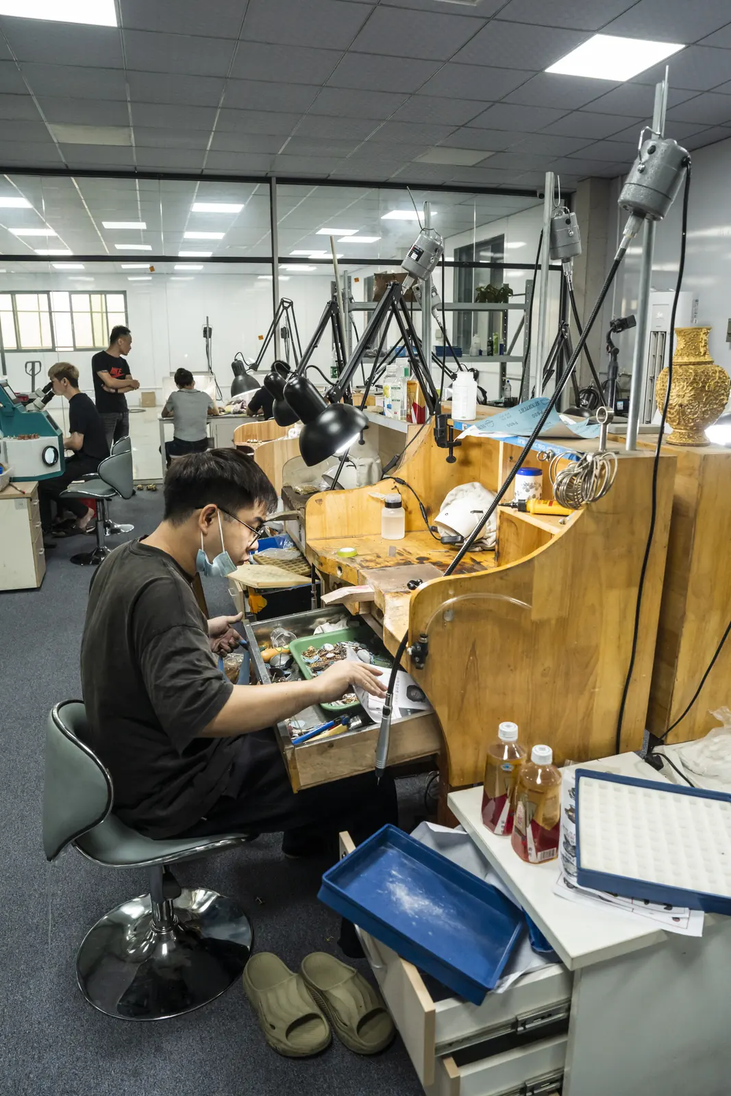 ORNOVAI craftsperson hand-finishing custom jewelry at our Guangzhou factory