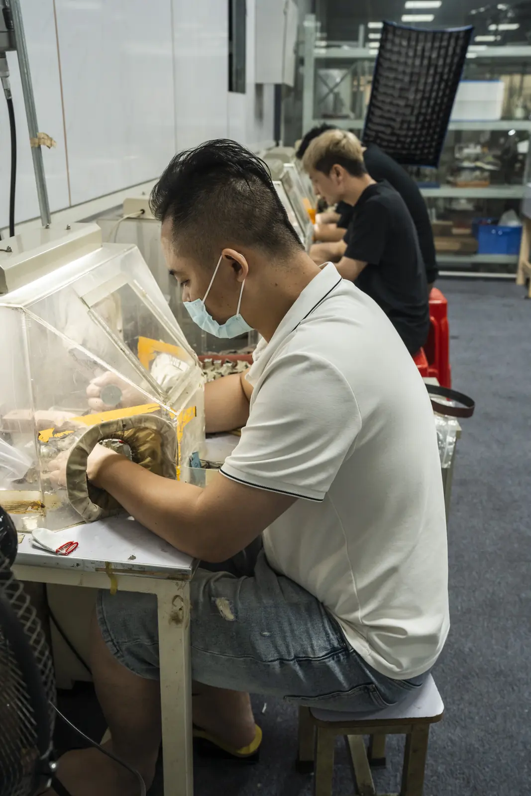 ORNOVAI craftsperson working on jewelry at a finishing bench